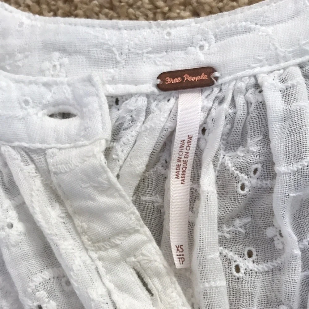 NWT! FREE PEOPLE Size XS white eyelet oversized top